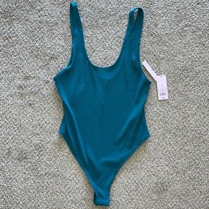 Teal body suit
